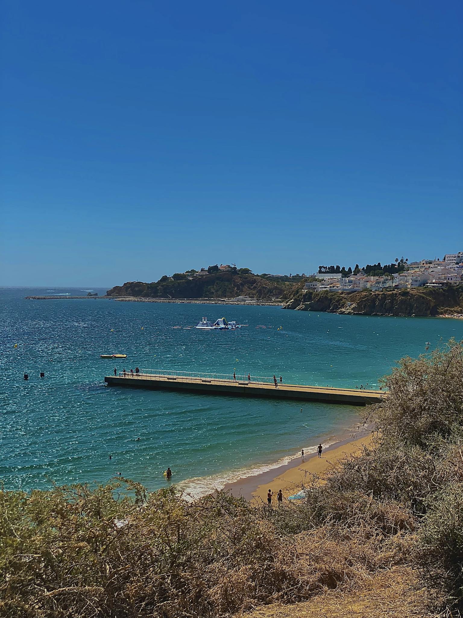 Picturesque summer view of the ocean and coastline in the Faro District, Portugal.